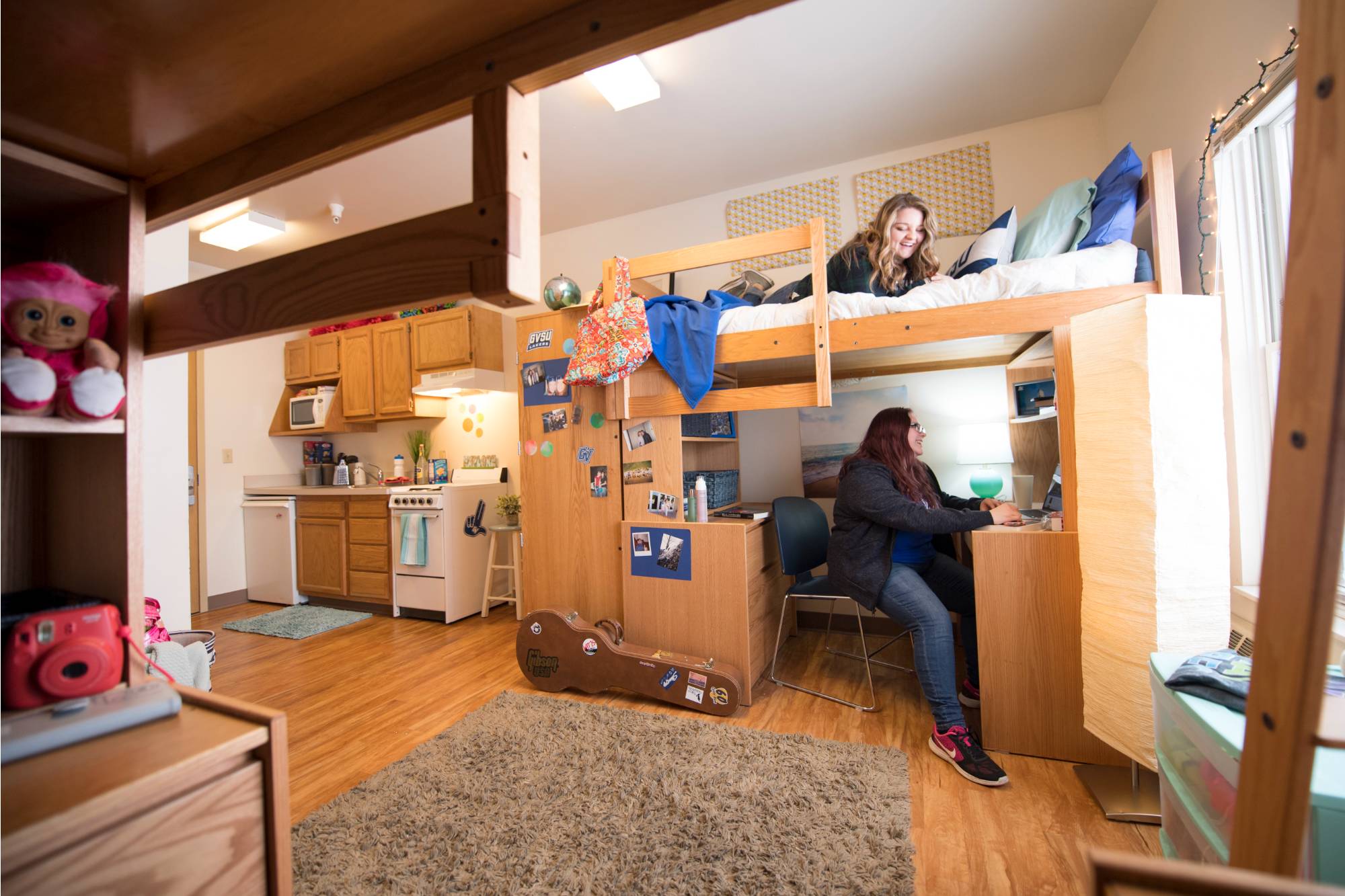 Students in a one bedroom apartment style room